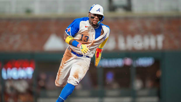 Jul 29, 2023; Cumberland, Georgia, USA; Atlanta Braves right fielder Ronald Acuna Jr. (13) runs against the Milwaukee Brewers during the eighth inning at Truist Park. Mandatory Credit: Dale Zanine-USA TODAY Sports